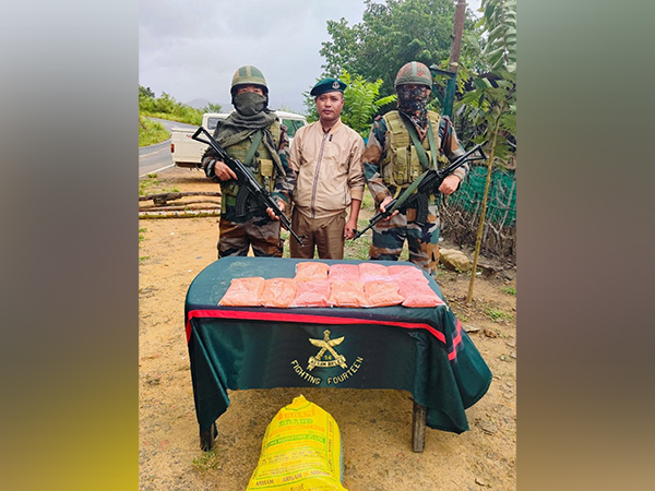 Assam Rifles with the seized Methamphetamine tablets. (Photo/AssamRifles) Assam Rifles with the seized Methamphetamine tablets. (Photo/AssamRifles)