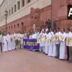 INDIA bloc MPs protest in Parliament premises over SIR in…