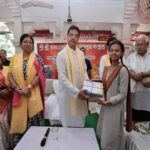Tripura CM distributes textbooks to underprivileged students from different schools
