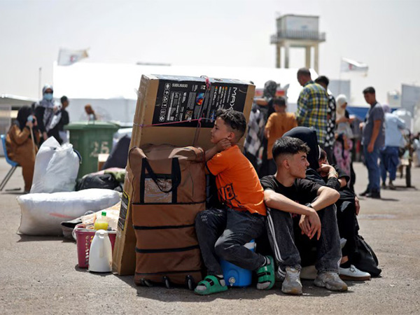 An Afghan family deported from Iran rests with their belongings at a camp for returning migrants near the Islam Qala border crossing in Herat province, Afghanistan (File Photo/Reuters) An Afghan family deported from Iran rests with their belongings at a camp for returning migrants near the Islam Qala border crossing in Herat province, Afghanistan (File Photo/Reuters)