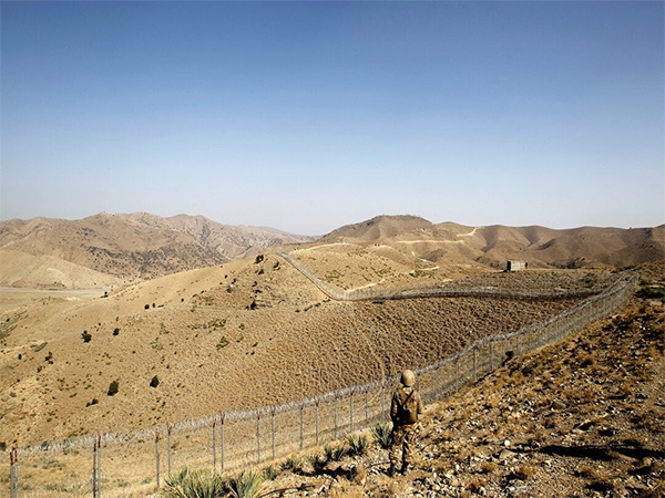 A soldier stands guard along the border fence outside the Kitton outpost on the border with Afghanistan in Khyber Pakhtunkhwa (File Photo/Reuters) A soldier stands guard along the border fence outside the Kitton outpost on the border with Afghanistan in Khyber Pakhtunkhwa (File Photo/Reuters)