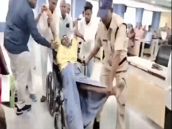 Differently-abled person dragged during Prajavani event. (Photo: Kavitha/X) Differently-abled person dragged during Prajavani event. (Photo: Kavitha/X)