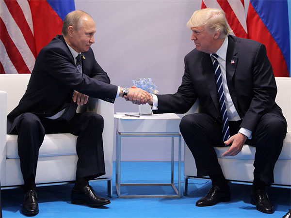 A 2017 file photo of Vladimir Putin with Donald Trump at the G20 summit in Hamburg (File Photo/Reuters) A 2017 file photo of Vladimir Putin with Donald Trump at the G20 summit in Hamburg (File Photo/Reuters)