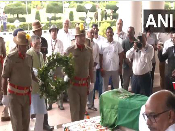 Jharkhand Governor Santosh Gangwar pays tribute to Education Minister Ramdas Soren (Photo/ANI) Jharkhand Governor Santosh Gangwar pays tribute to Education Minister Ramdas Soren (Photo/ANI)