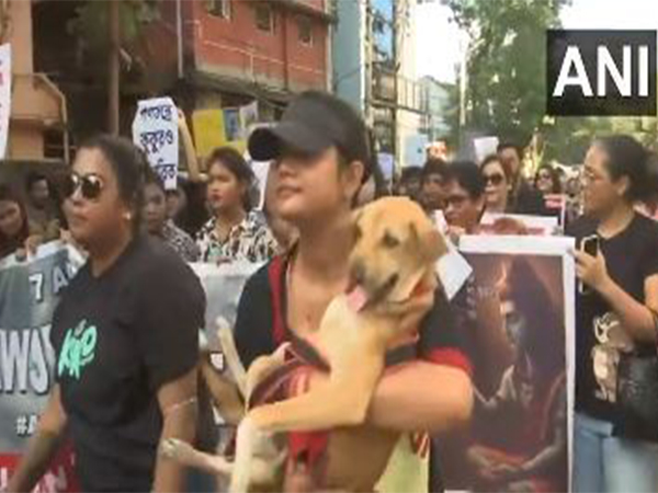 Animal lovers in West Bengal's Siliguri stage a protest (Photo/ANI) Animal lovers in West Bengal's Siliguri stage a protest (Photo/ANI)