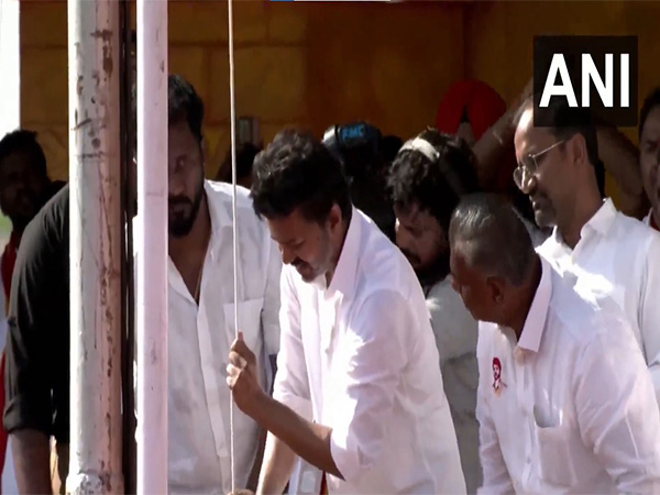 TVK chief and Actor Vijay hoists party flag TVK chief and Actor Vijay hoists party flag