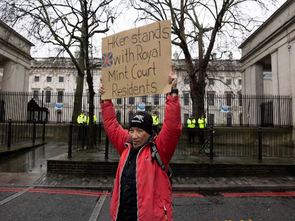 A protestor holds a placard during a demonstration against the proposed site of the new Chinese Embassy, outside Royal Mint Court, in London (Image/Reuters) A protestor holds a placard during a demonstration against the proposed site of the new Chinese Embassy, outside Royal Mint Court, in London (Image/Reuters)