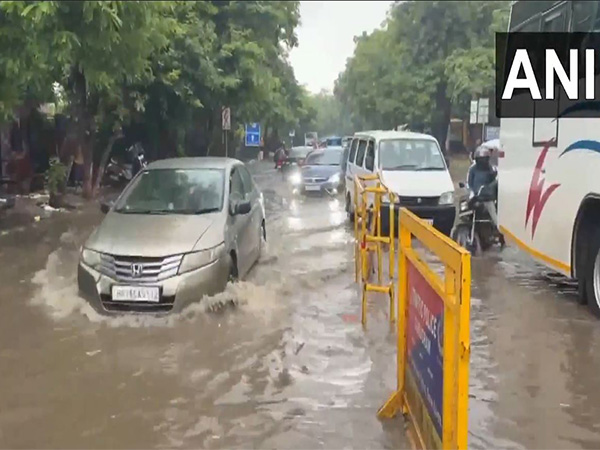 Rain causes waterlogging in several parts of Gurugram. (Photo/ANI) Rain causes waterlogging in several parts of Gurugram. (Photo/ANI)