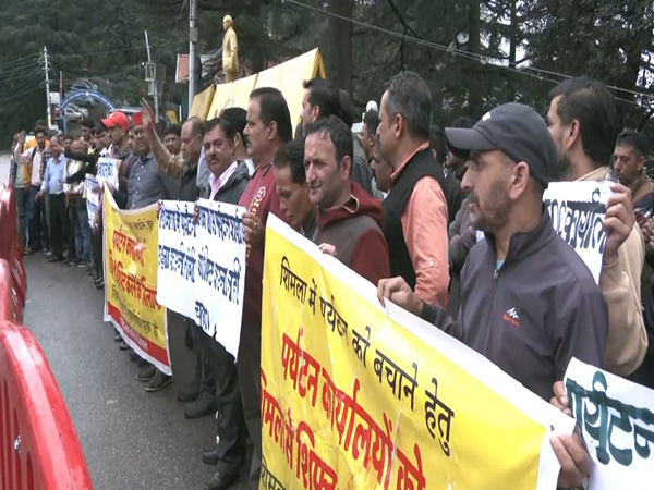 Tourism industry worker protest in Shimla (Photo/ANI) Tourism industry worker protest in Shimla (Photo/ANI)