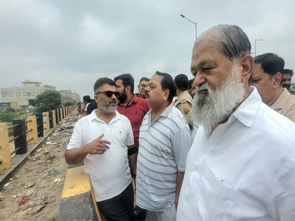 Haryana Minister Anil Vij inspects rising water levels of Tangri river (Photo/ANI) Haryana Minister Anil Vij inspects rising water levels of Tangri river (Photo/ANI)