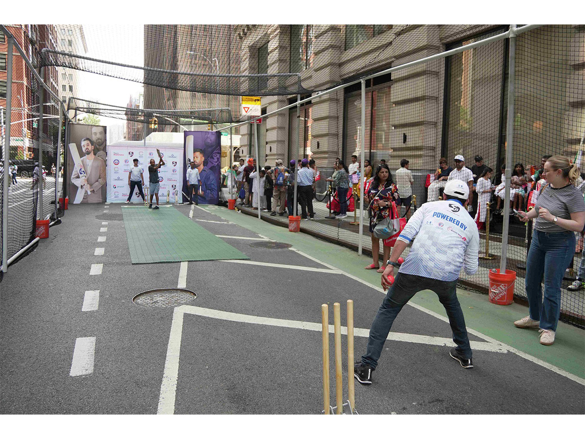 Passersby participated in a game of box cricket on Park Avenue, organized by Cricmax Connect Passersby participated in a game of box cricket on Park Avenue, organized by Cricmax Connect