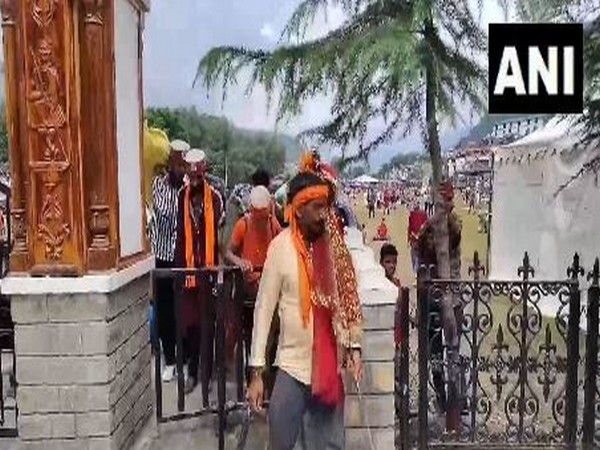 Devotees returning from Chamba after Manimahesh Yatra was suspended (Photo/ANI) Devotees returning from Chamba after Manimahesh Yatra was suspended (Photo/ANI)