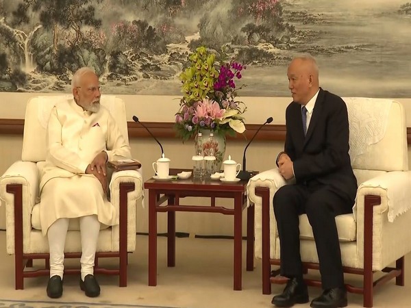 PM Modi with CCP Secretariat Secretary Cai Qi (Photo: ANI/DD) PM Modi with CCP Secretariat Secretary Cai Qi (Photo: ANI/DD)