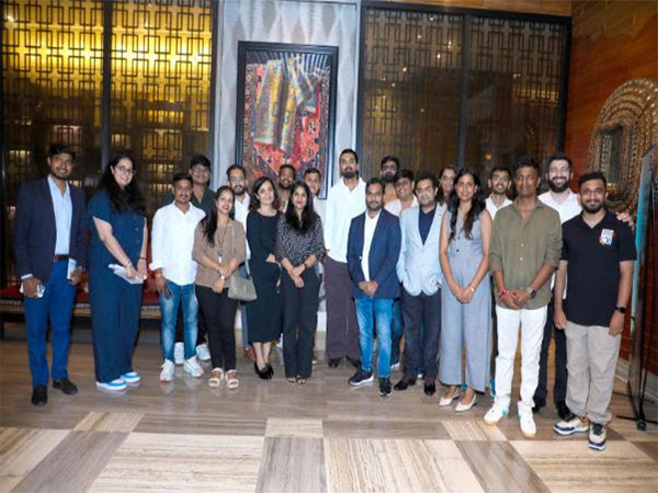 KL Rahul with contest winners and Bajaj Finserv employees KL Rahul with contest winners and Bajaj Finserv employees