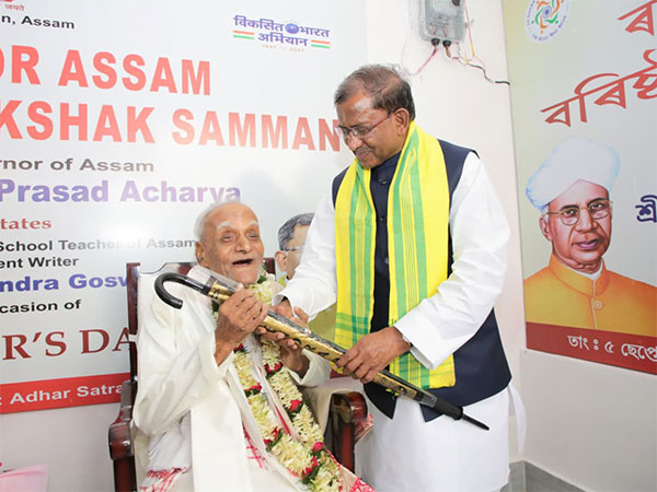 Assam Governor Lakshman Prasad Acharya felicitated Rajat Chandra Goswami, a 94-year-old primary school teacher. (Photo/ANI) Assam Governor Lakshman Prasad Acharya felicitated Rajat Chandra Goswami, a 94-year-old primary school teacher. (Photo/ANI)