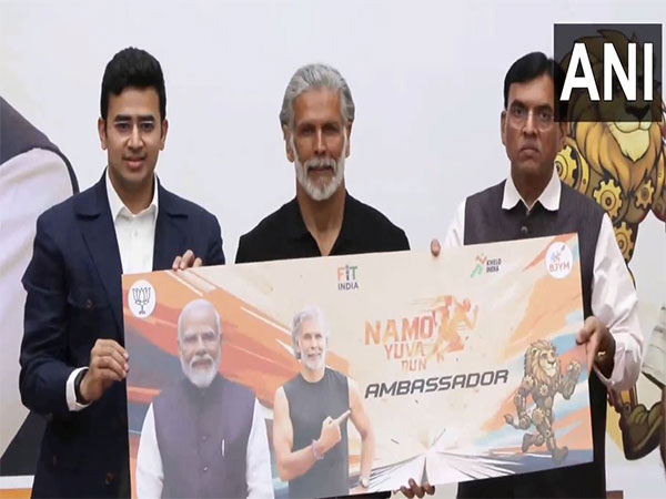 Milind Soman with BJP MP Tejasvi Surya, Union Minister Mansukh Mandaviya (Photo: ANI) Milind Soman with BJP MP Tejasvi Surya, Union Minister Mansukh Mandaviya (Photo: ANI)