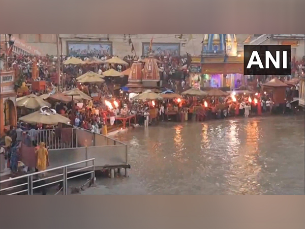 Devotees take a holy dip in the River Ganga after a total lunar eclipse (Photo/ANI) Devotees take a holy dip in the River Ganga after a total lunar eclipse (Photo/ANI)