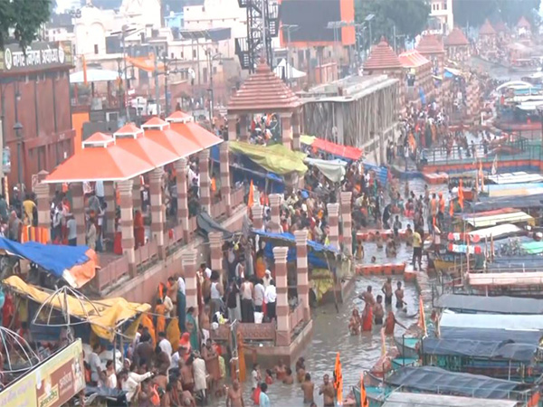 Devotees take a holy dip in River Saryu in Ayodhya after total lunar eclipse (Photo/ANI) Devotees take a holy dip in River Saryu in Ayodhya after total lunar eclipse (Photo/ANI)