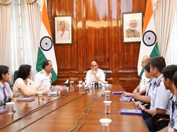 Rajnath Singh interacts with students of Navy Children School. (Photo/ANI) Rajnath Singh interacts with students of Navy Children School. (Photo/ANI)