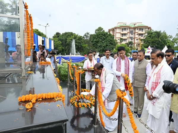 Assam Governor Lakshman Prasad Acharya and Chief Minister Himanta Biswa Sarma pay floral tributes to Bharat Ratna Dr Bhupen Hazarika. (Photo/ANI) Assam Governor Lakshman Prasad Acharya and Chief Minister Himanta Biswa Sarma pay floral tributes to Bharat Ratna Dr Bhupen Hazarika. (Photo/ANI)