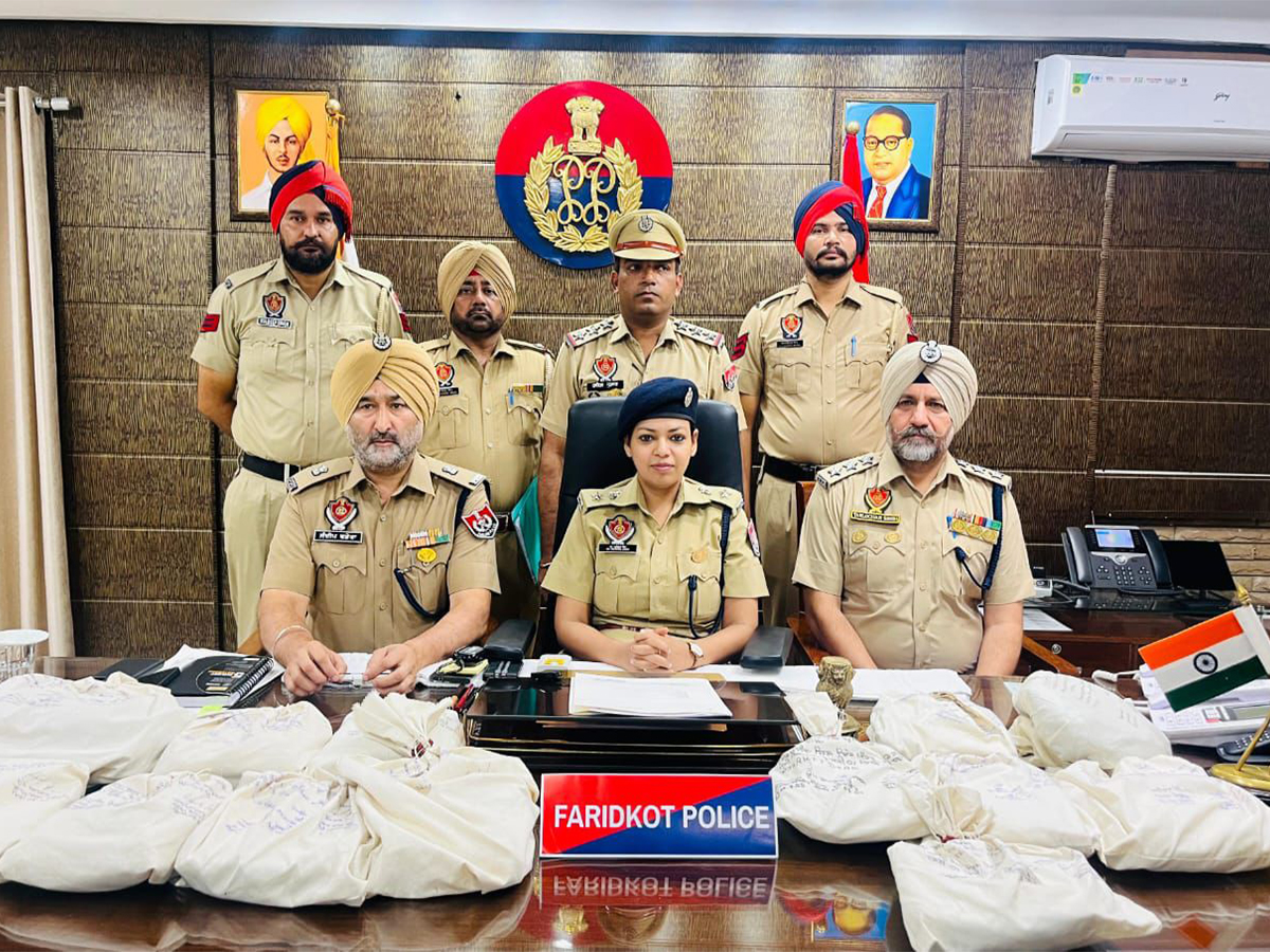 Punjab Police officials with recovered 12.1 kg of Heroin (Photo/Punjabpolice) Punjab Police officials with recovered 12.1 kg of Heroin (Photo/Punjabpolice)
