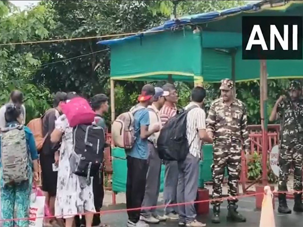 Indians cross India-Nepal border in Panitanki amid tense situation in Nepal (Photo/ANI) Indians cross India-Nepal border in Panitanki amid tense situation in Nepal (Photo/ANI)