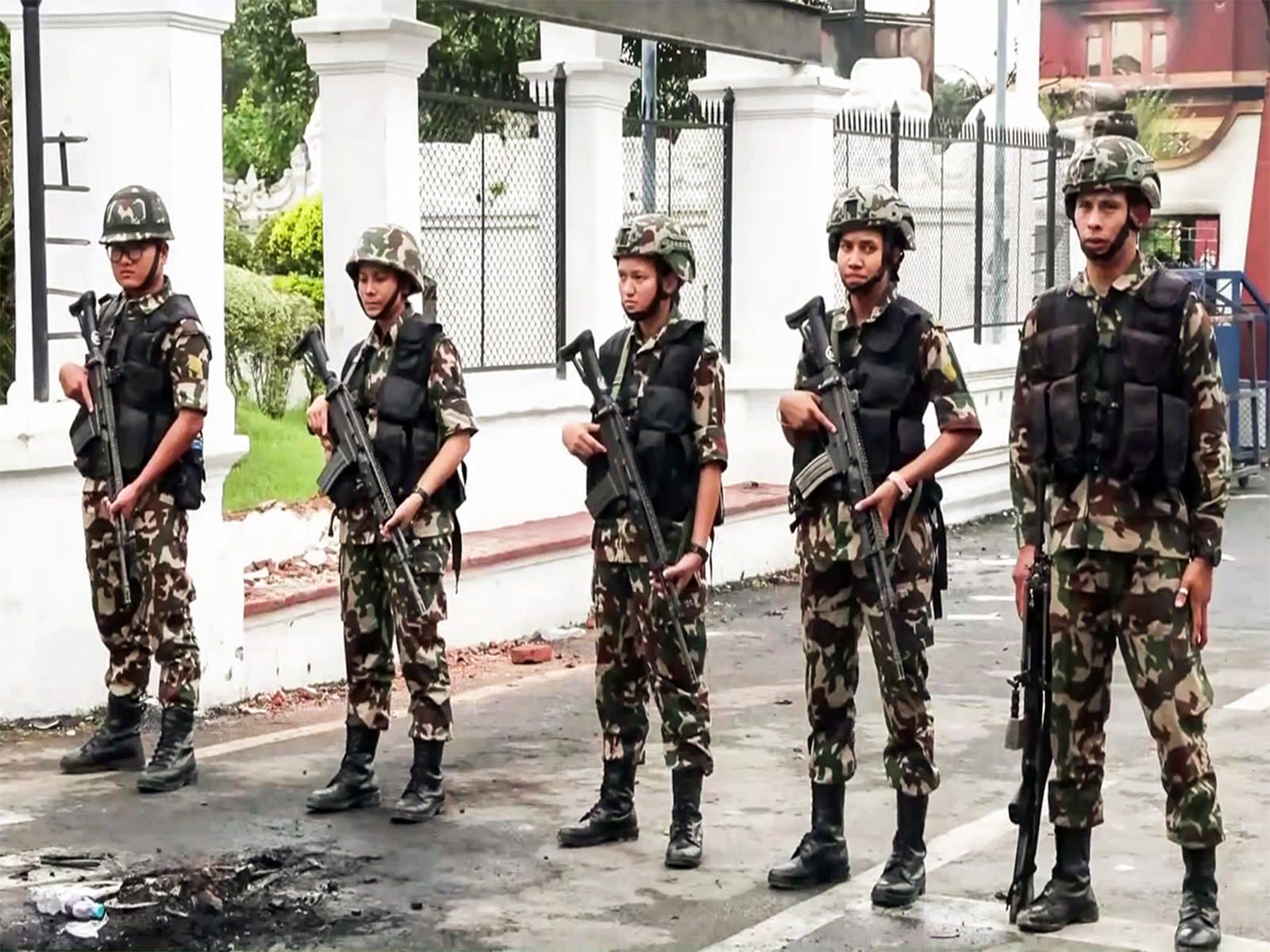 Army personnel stand guard outside the Nepal Rashtrapati Bhawan (Photo/ANI) Army personnel stand guard outside the Nepal Rashtrapati Bhawan (Photo/ANI)