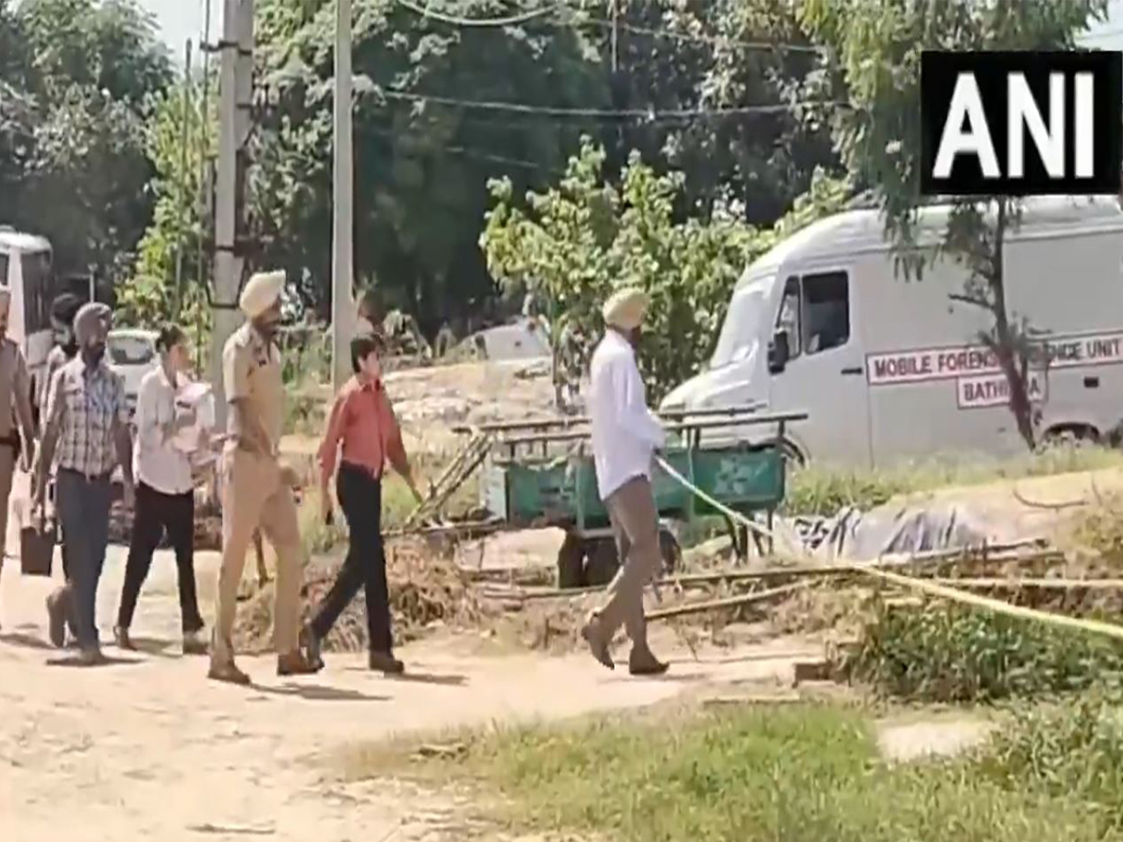 Police and forensic teams inspecting the site (Photo/ANI) Police and forensic teams inspecting the site (Photo/ANI)