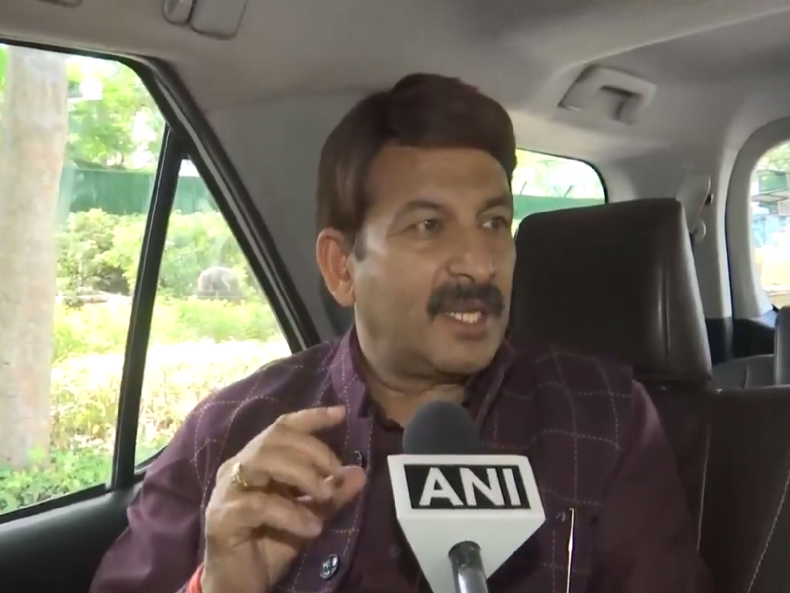 BJP MP Manoj Tiwari (Photo/ANI) BJP MP Manoj Tiwari (Photo/ANI)