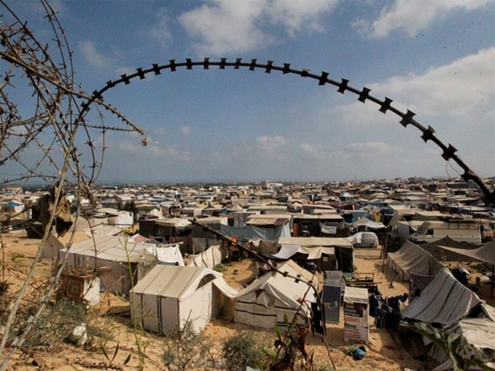 Displaced Palestinians seek shelter in the overcrowded al-Mawasi camp as Israeli airstrikes continue on Gaza City (File Photo/Reuters) Displaced Palestinians seek shelter in the overcrowded al-Mawasi camp as Israeli airstrikes continue on Gaza City (File Photo/Reuters)
