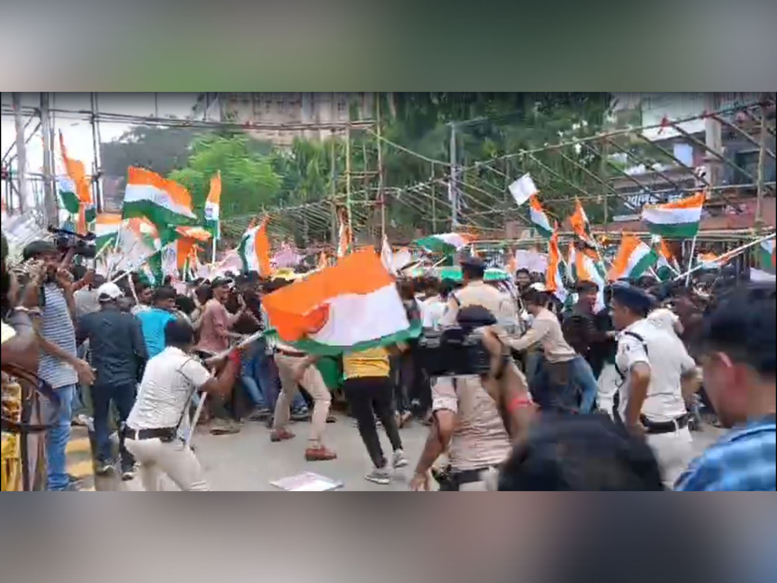 Visual of Bihar police official swinging national flag at protesting students (Photo/ANI) Visual of Bihar police official swinging national flag at protesting students (Photo/ANI)