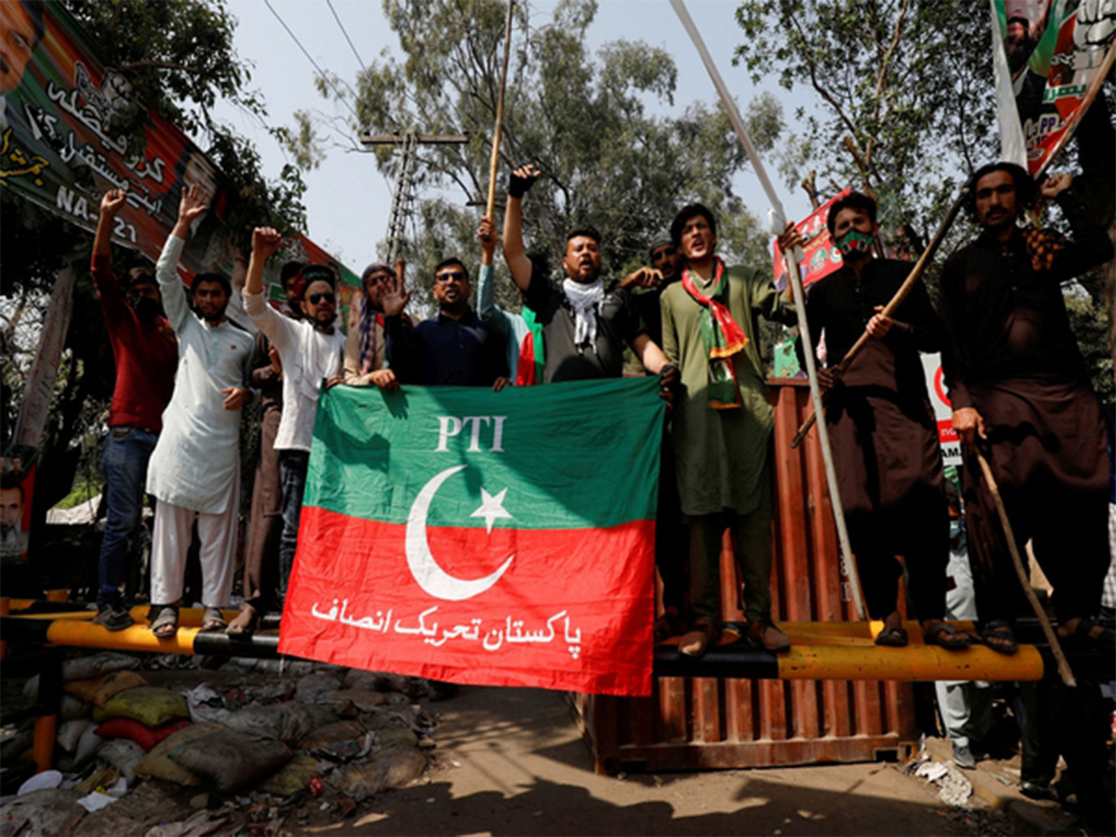 PTI supporters stage protest demanding release of Commonwealth observers’ election report (File Photo/Reuters) PTI supporters stage protest demanding release of Commonwealth observers’ election report (File Photo/Reuters)