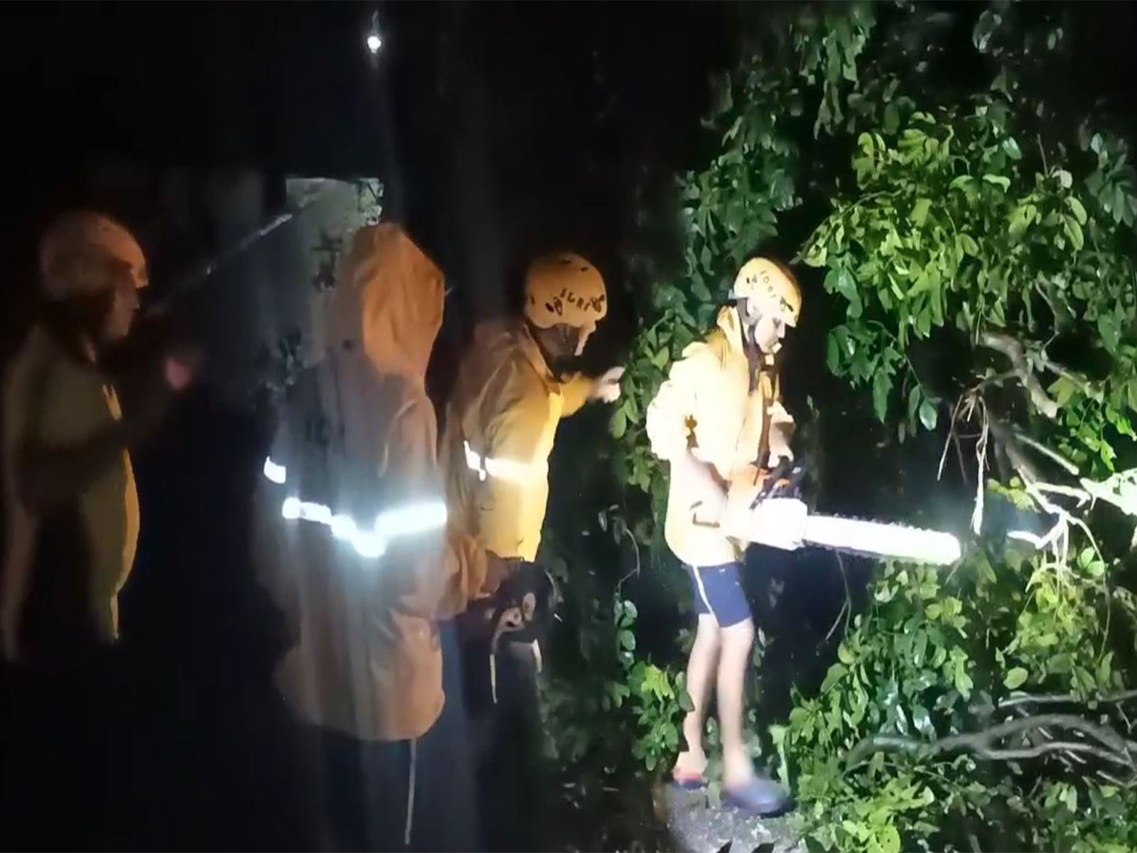 SDRF rescues 3 people after Chandrabhaga River inundated amid heavy rainfall in Rishikesh. (Photo/ANI) SDRF rescues 3 people after Chandrabhaga River inundated amid heavy rainfall in Rishikesh. (Photo/ANI)