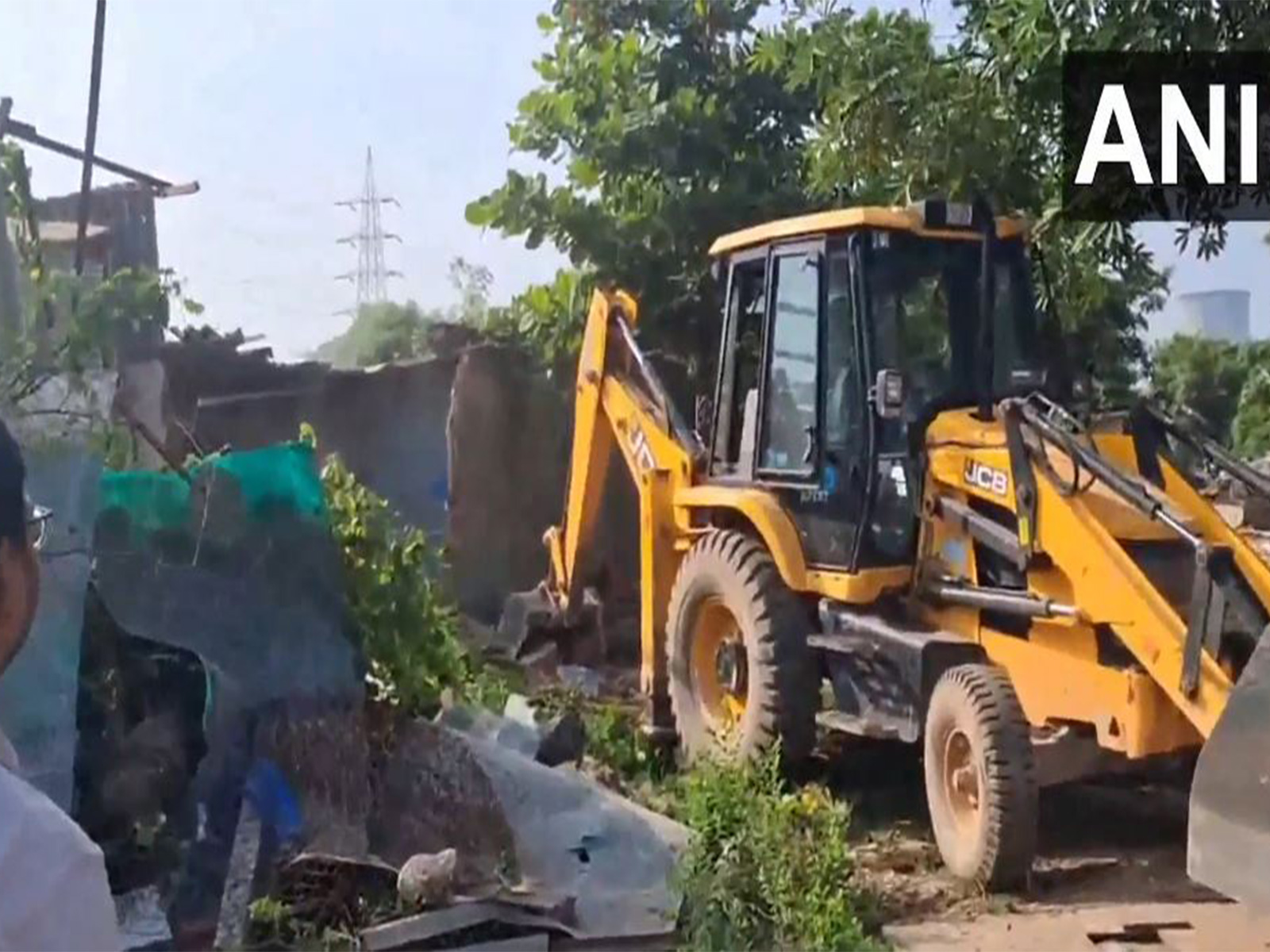Major demolition drive against illegal encroachments in Gandhinagar (Photo/ANI) Major demolition drive against illegal encroachments in Gandhinagar (Photo/ANI)