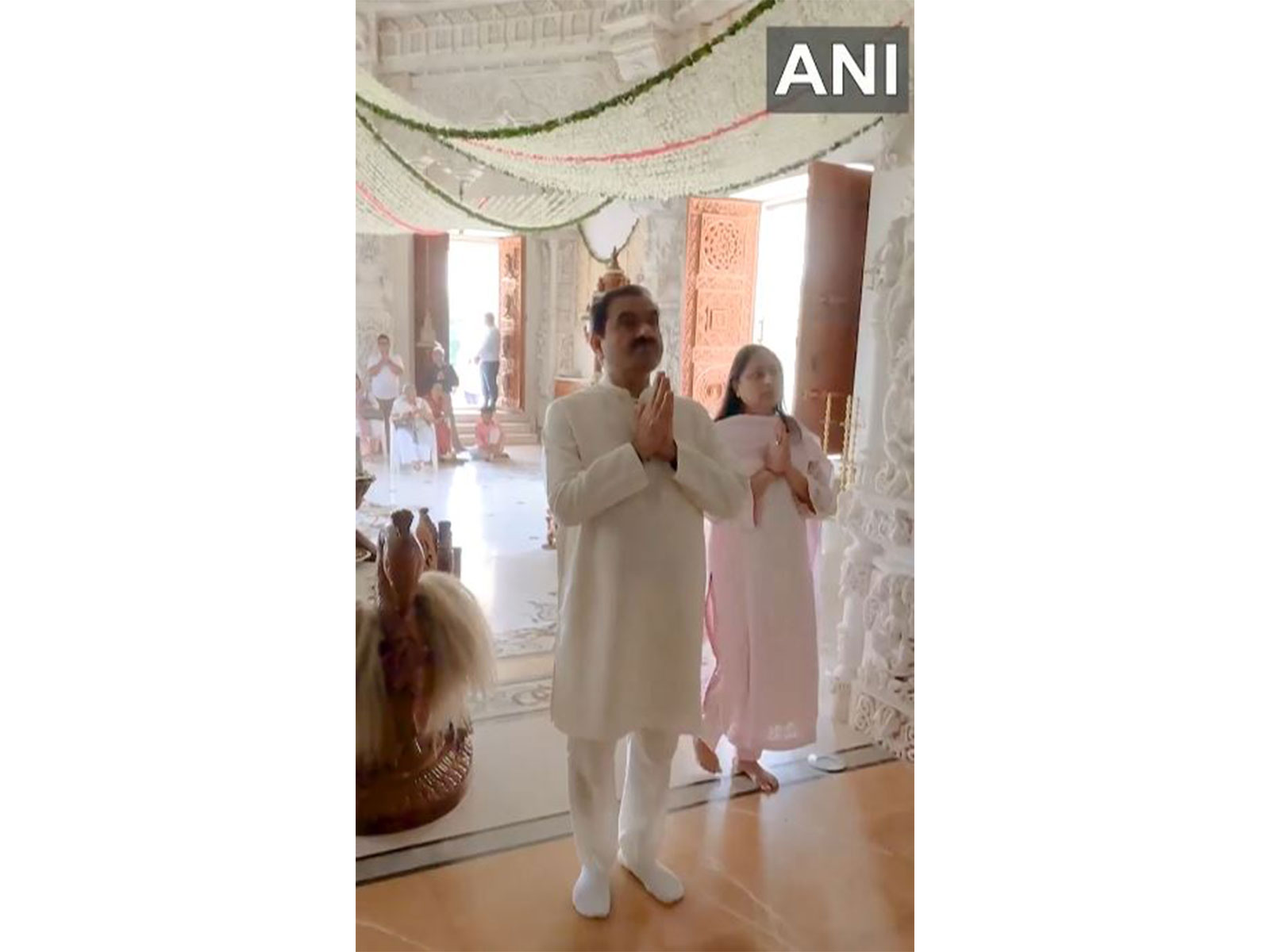 Adani Group Chairman Gautam Adani, accompanied by his wife, offered prayers at a Jain temple in Ahmedabad (Photo/ANI) Adani Group Chairman Gautam Adani, accompanied by his wife, offered prayers at a Jain temple in Ahmedabad (Photo/ANI)