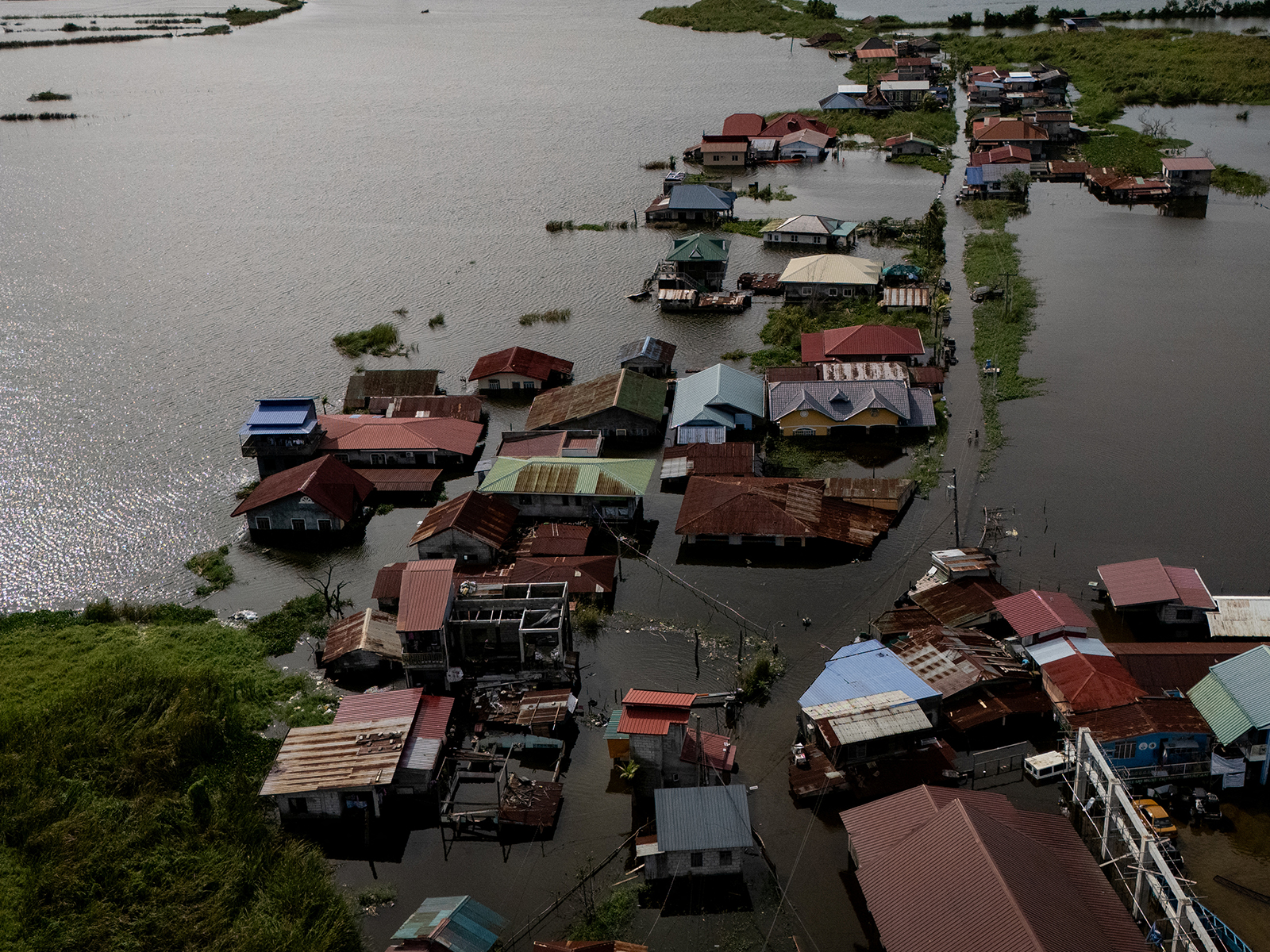 A drone view shows homes inundated by high tide and flooding brought by Typhoon Co-may in Calumpit, Bulacan, Philippines in July 25, 2025. (File Photo/Reuters) A drone view shows homes inundated by high tide and flooding brought by Typhoon Co-may in Calumpit, Bulacan, Philippines in July 25, 2025. (File Photo/Reuters)