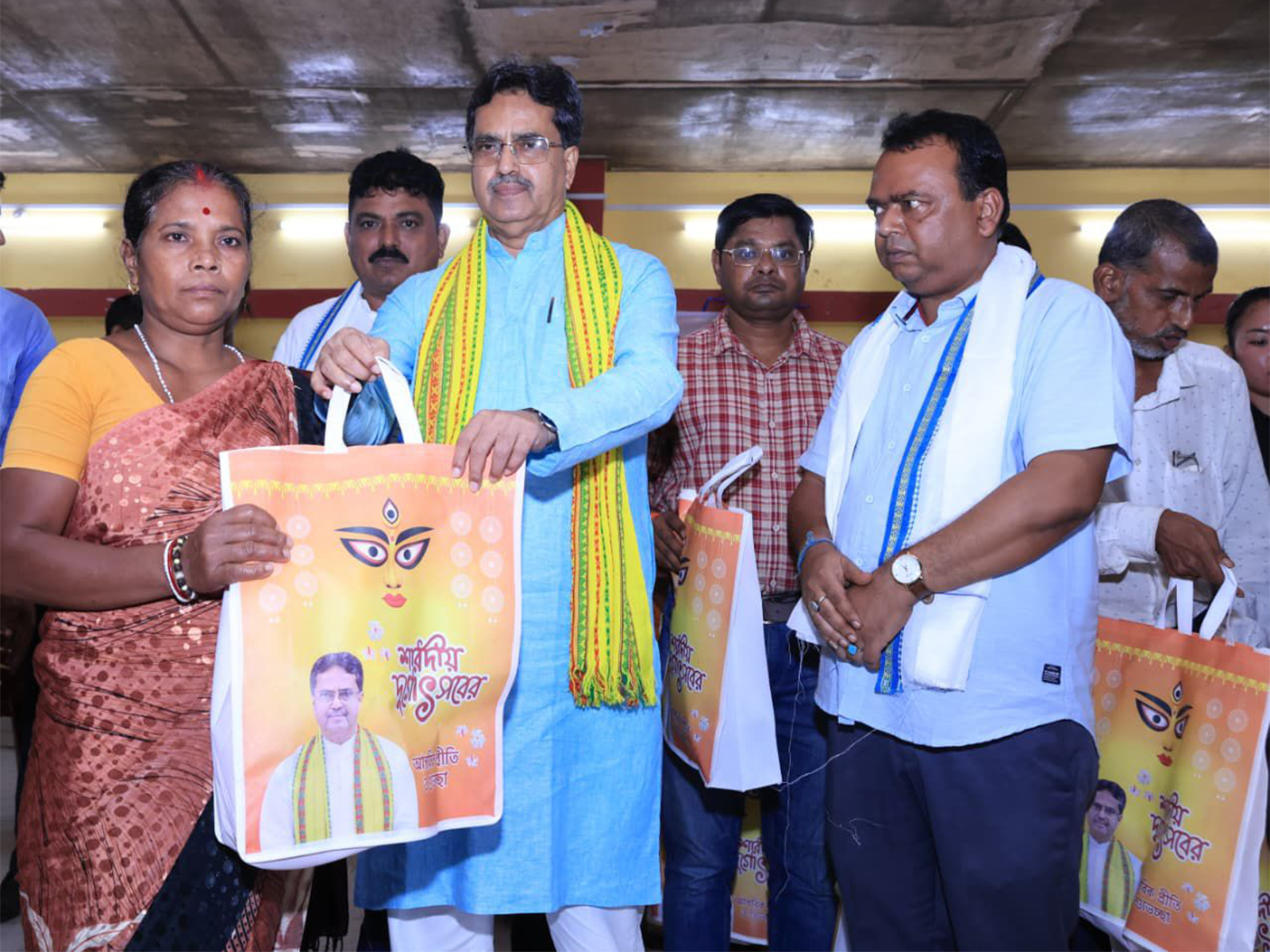 CM Manik Saha distributes saris ahead of Durga Puja (Photo/ANI) CM Manik Saha distributes saris ahead of Durga Puja (Photo/ANI)