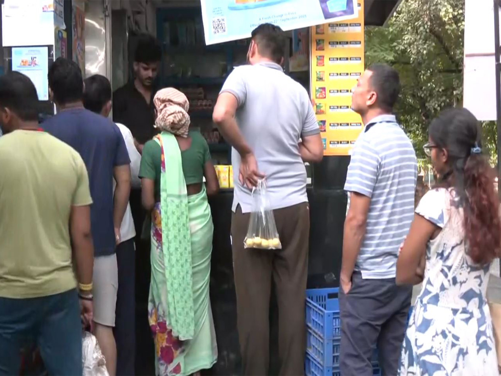 Consumers outside a Milk booth in Delhi (Photo/ANI) Consumers outside a Milk booth in Delhi (Photo/ANI)