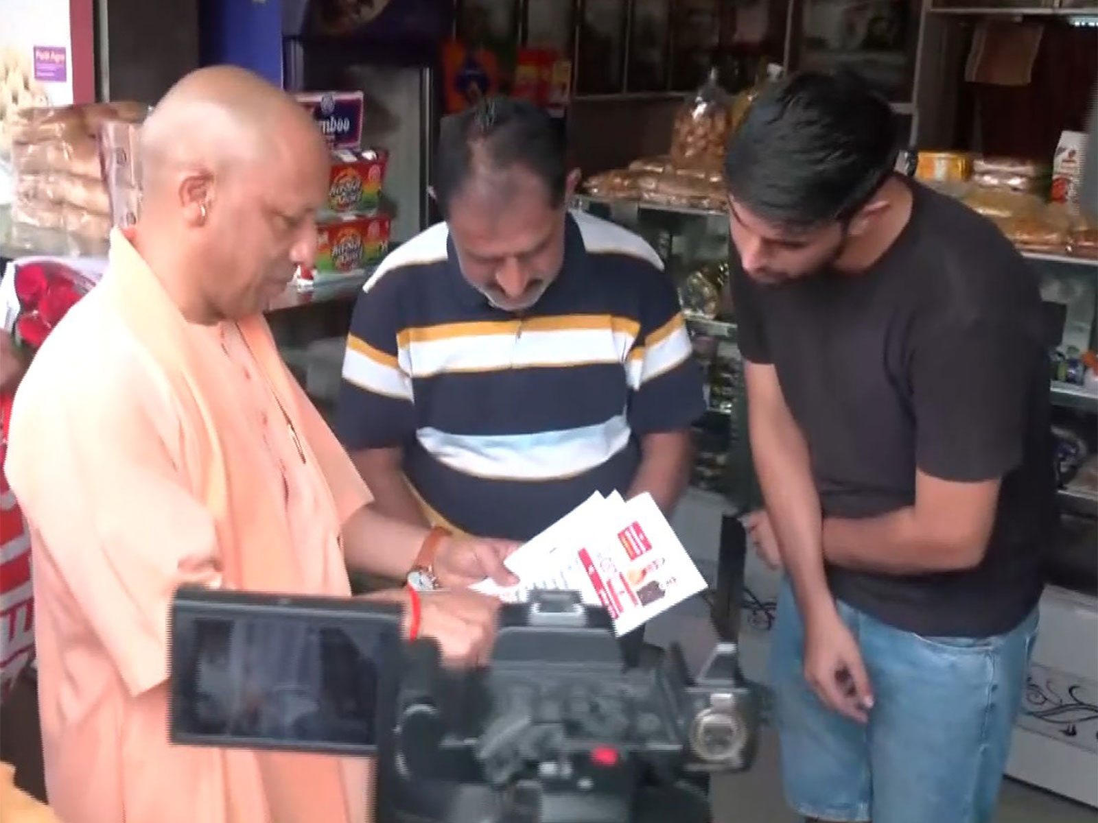 UP CM Yogi Adityanath interacts with traders in UP (Photo/ANI) UP CM Yogi Adityanath interacts with traders in UP (Photo/ANI)