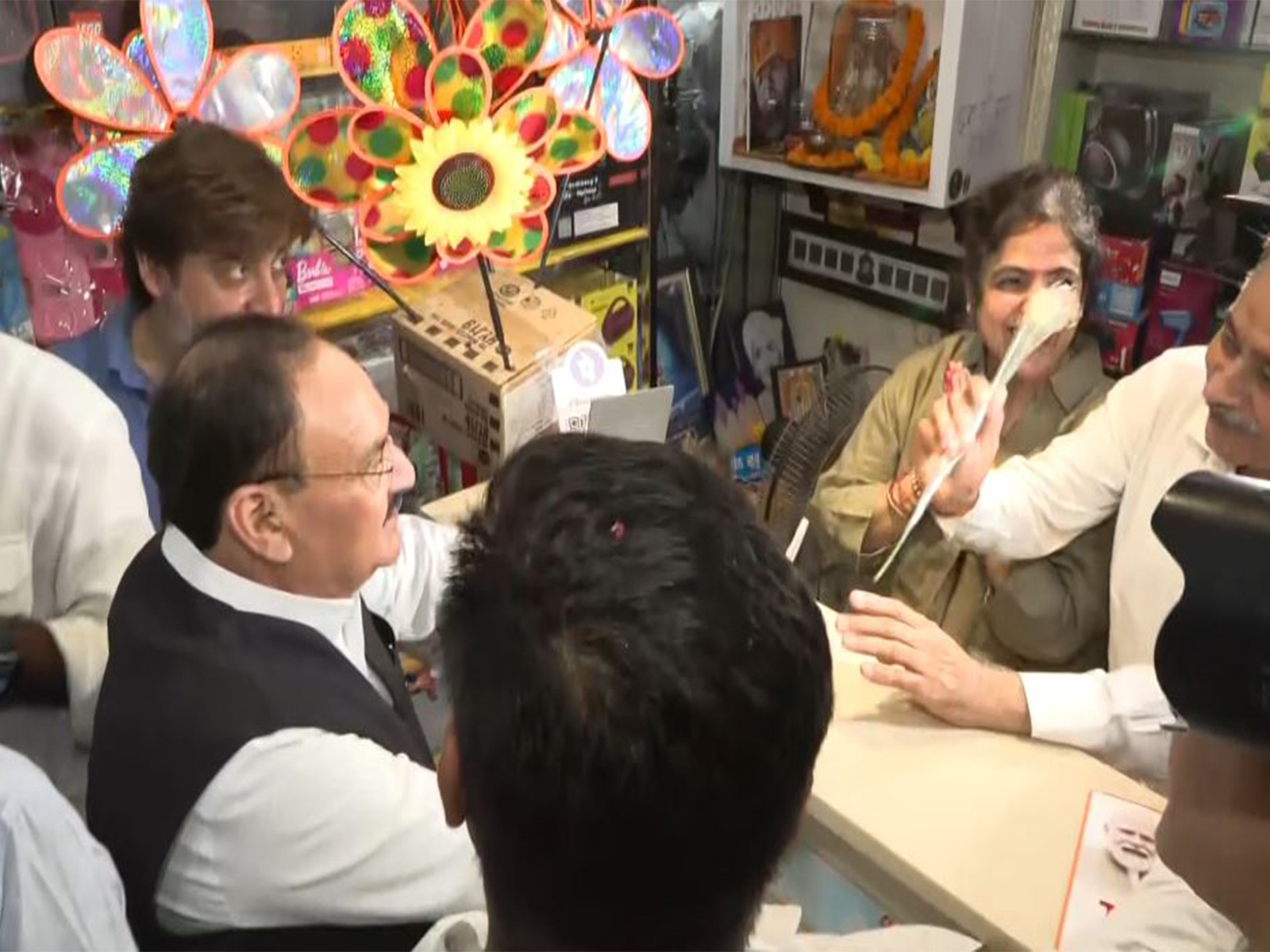 Union Minister JP Nadda interacts with local shopkeepers (Photo/ANI) Union Minister JP Nadda interacts with local shopkeepers (Photo/ANI)