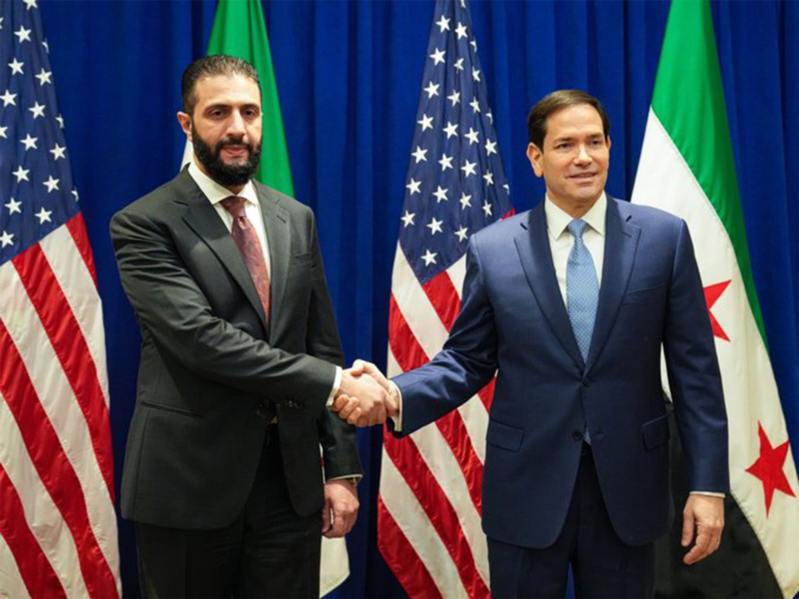 Syrian President al-Sharaa with US Secretary of State Marco Rubio (Right) (Photo credit/@SecRubio)) Syrian President al-Sharaa with US Secretary of State Marco Rubio (Right) (Photo credit/@SecRubio))