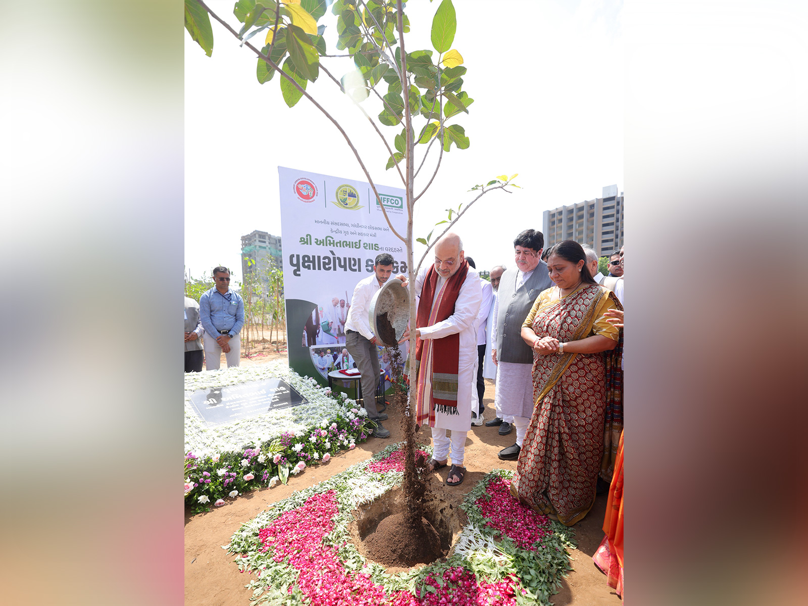 Amit Shah participates in tree plantation drive in Gandhinagar. (Photo/ANI) Amit Shah participates in tree plantation drive in Gandhinagar. (Photo/ANI)