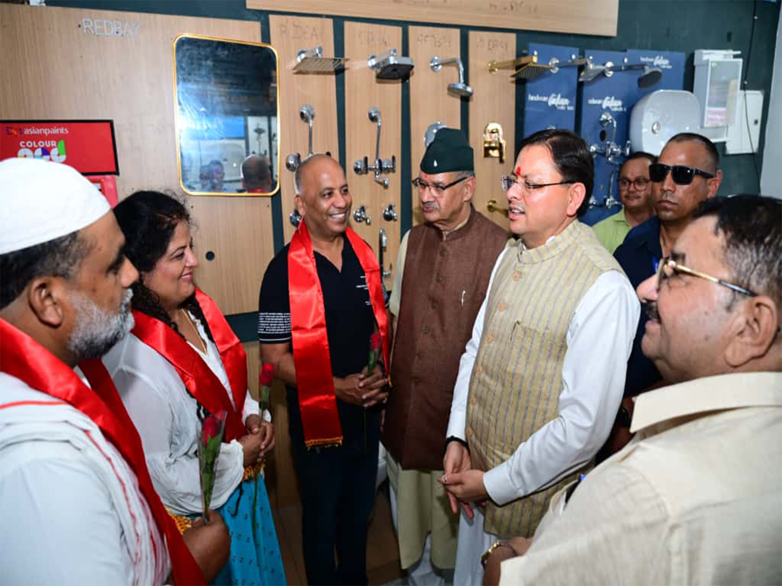 CM Dhami interacting with shopkeepers in Dehradun. (Photo/ANI) CM Dhami interacting with shopkeepers in Dehradun. (Photo/ANI)