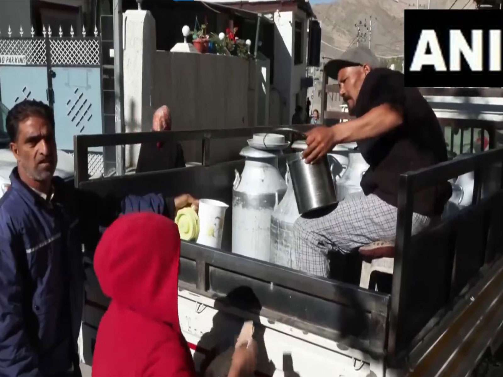 People buying milk amid restrcitions in Leh (Photo/ANI) People buying milk amid restrcitions in Leh (Photo/ANI)