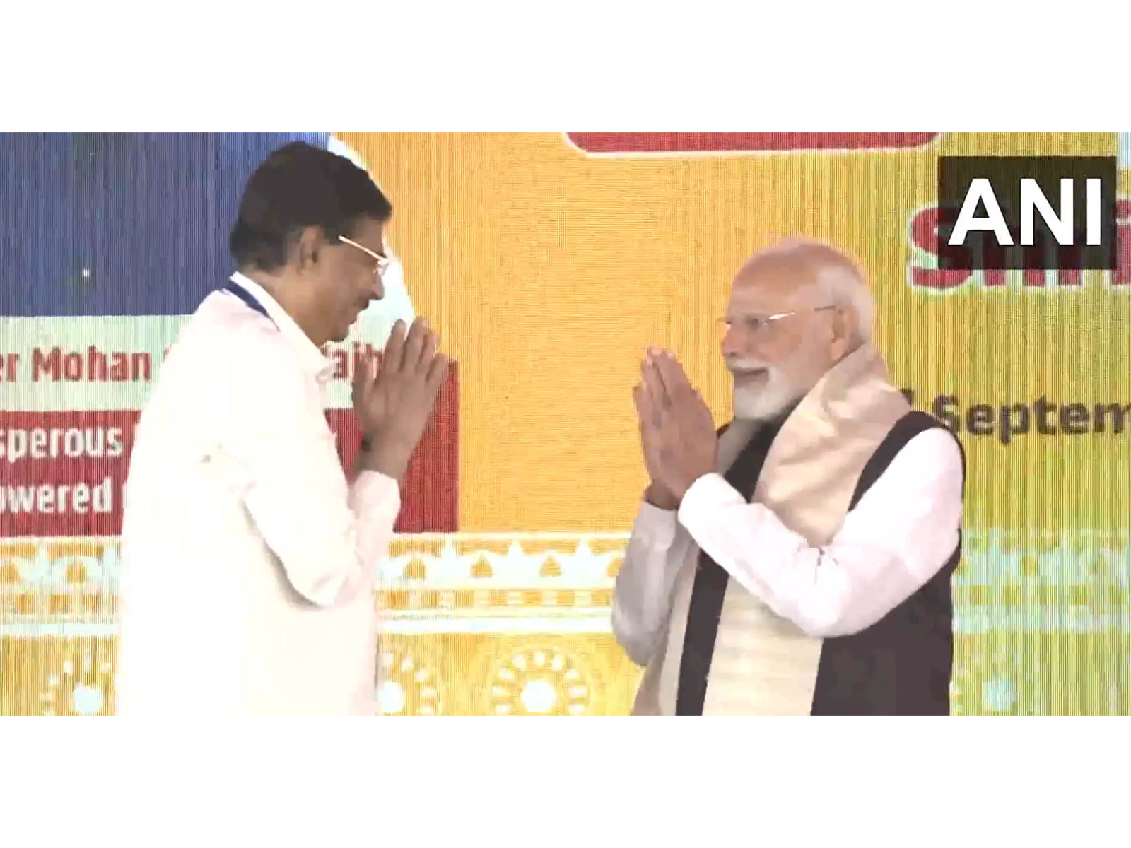 Governor Hari Babu Kambhampatii felicitate PM Modi (Photo/ANI) Governor Hari Babu Kambhampatii felicitate PM Modi (Photo/ANI)