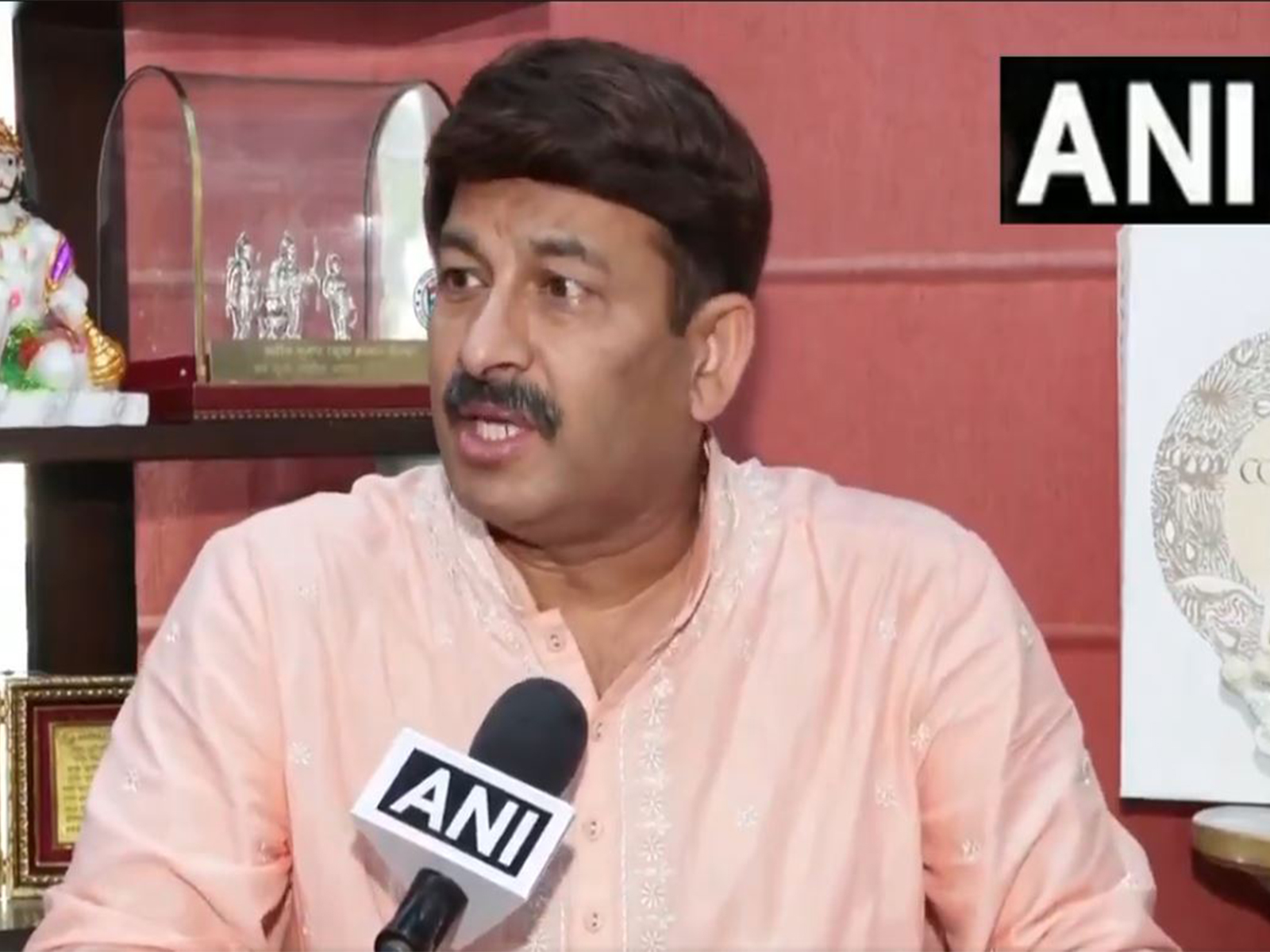 BJP MP Manoj Tiwari (Photo/ANI) BJP MP Manoj Tiwari (Photo/ANI)