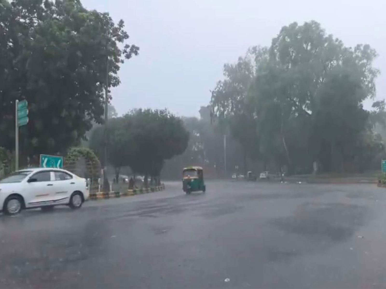 Parts of Delhi receive rainfall, visuals from Mandi House area (Photo/ANI) Parts of Delhi receive rainfall, visuals from Mandi House area (Photo/ANI)