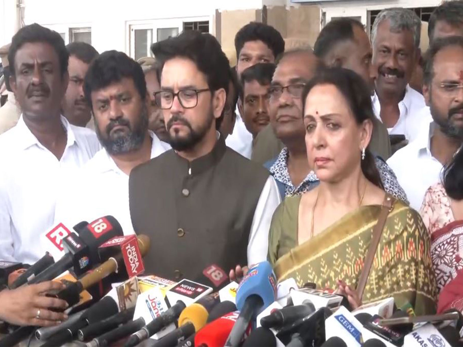 BJP MPs Hema Malini and Anurag Thakur (Photo/ANI) BJP MPs Hema Malini and Anurag Thakur (Photo/ANI)
