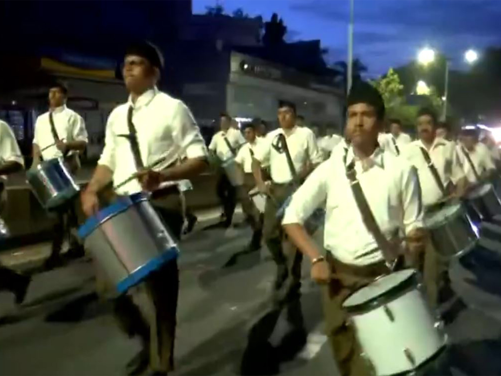 RSS holds route march in Pune on occasion of its 100th anniversary (Photo/ANI) RSS holds route march in Pune on occasion of its 100th anniversary (Photo/ANI)