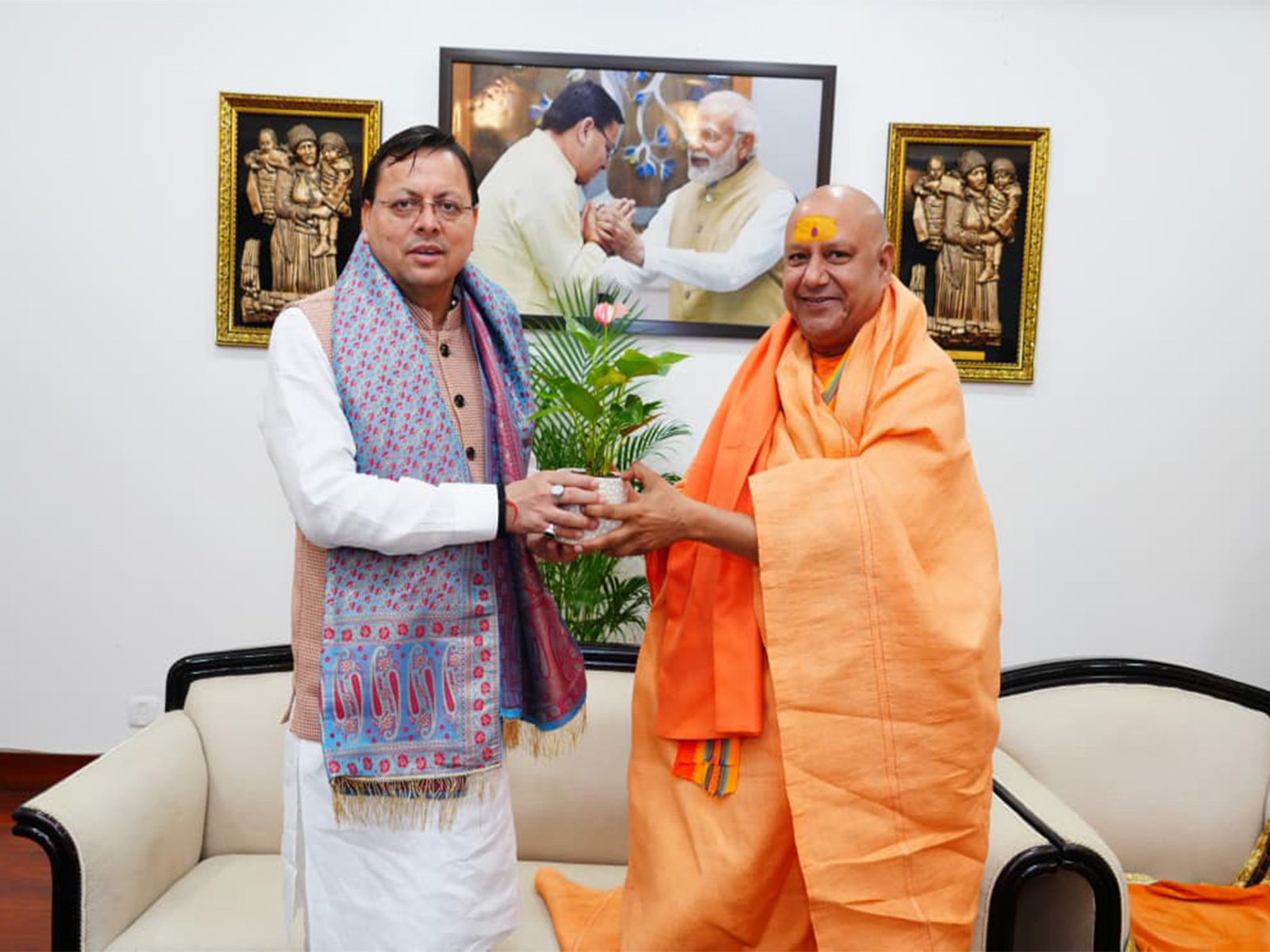 Uttarakhand CM Dhami meets Mahamandaleshwar Swami Yatindranand Giri Maharaj. (Photo/ANI) Uttarakhand CM Dhami meets Mahamandaleshwar Swami Yatindranand Giri Maharaj. (Photo/ANI)